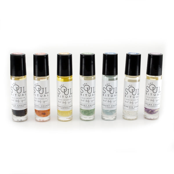 Seven chakra roller bottle collection full set. Infused with Reiki, chakra essential oil blend, crystals and gemstones. Black obsidian, carnelian, citirine, green aventurine, aquamarine, clear quartz, amethyst.