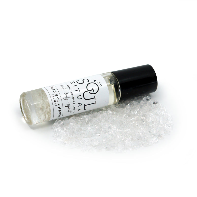 Palo Santo Essential Oil Infused with Clear Quartz Crystals Roll On